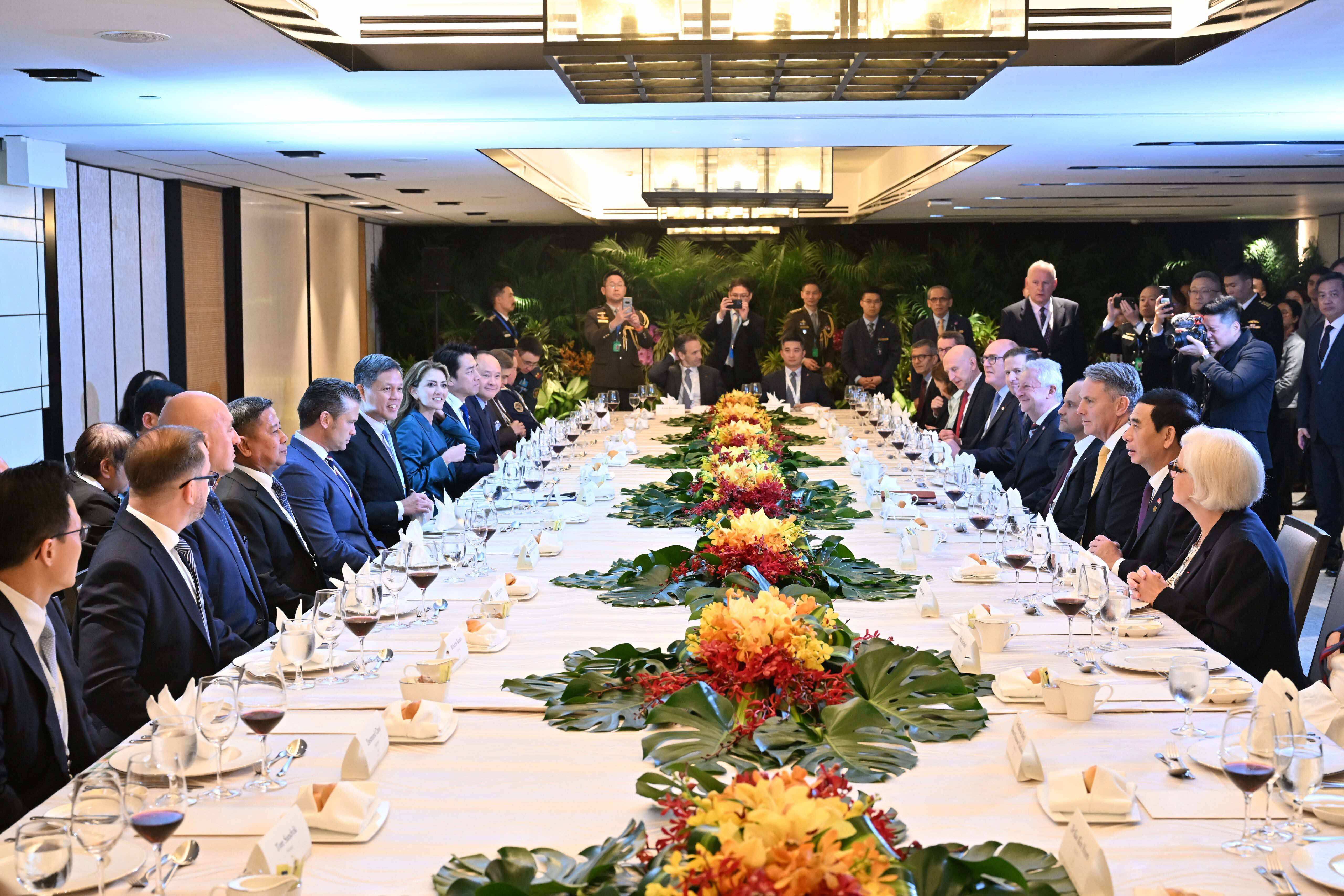 Minister for Defence Mr Chan Chun Sing hosting Ministers and their representatives to a Ministerial Roundtable during the 23rd Shangri-La Dialogue.